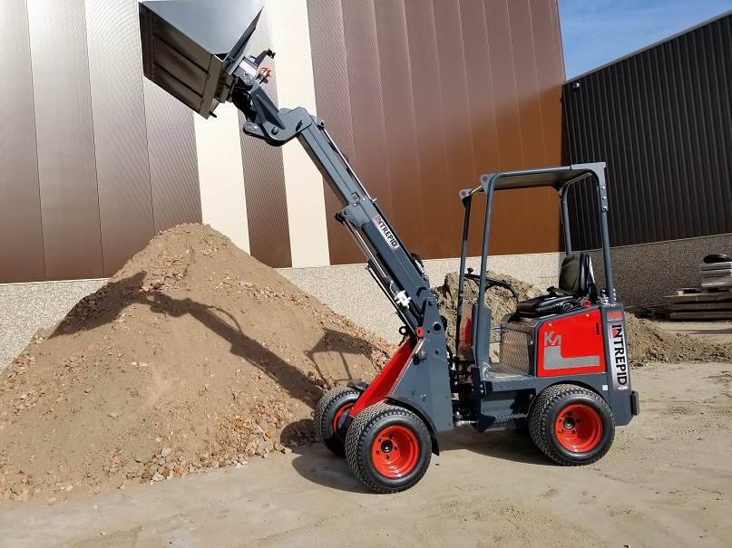 Mini articulating loader with telescopic boom